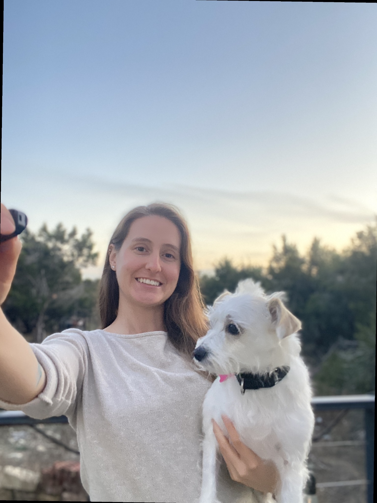 Regina, owner of Tiny in Texas, with her dog Sully